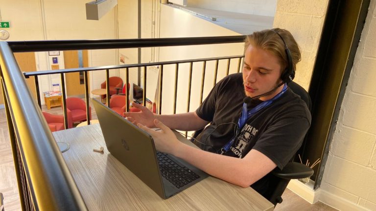 Mental health Helpline advisor speaking to someone in need